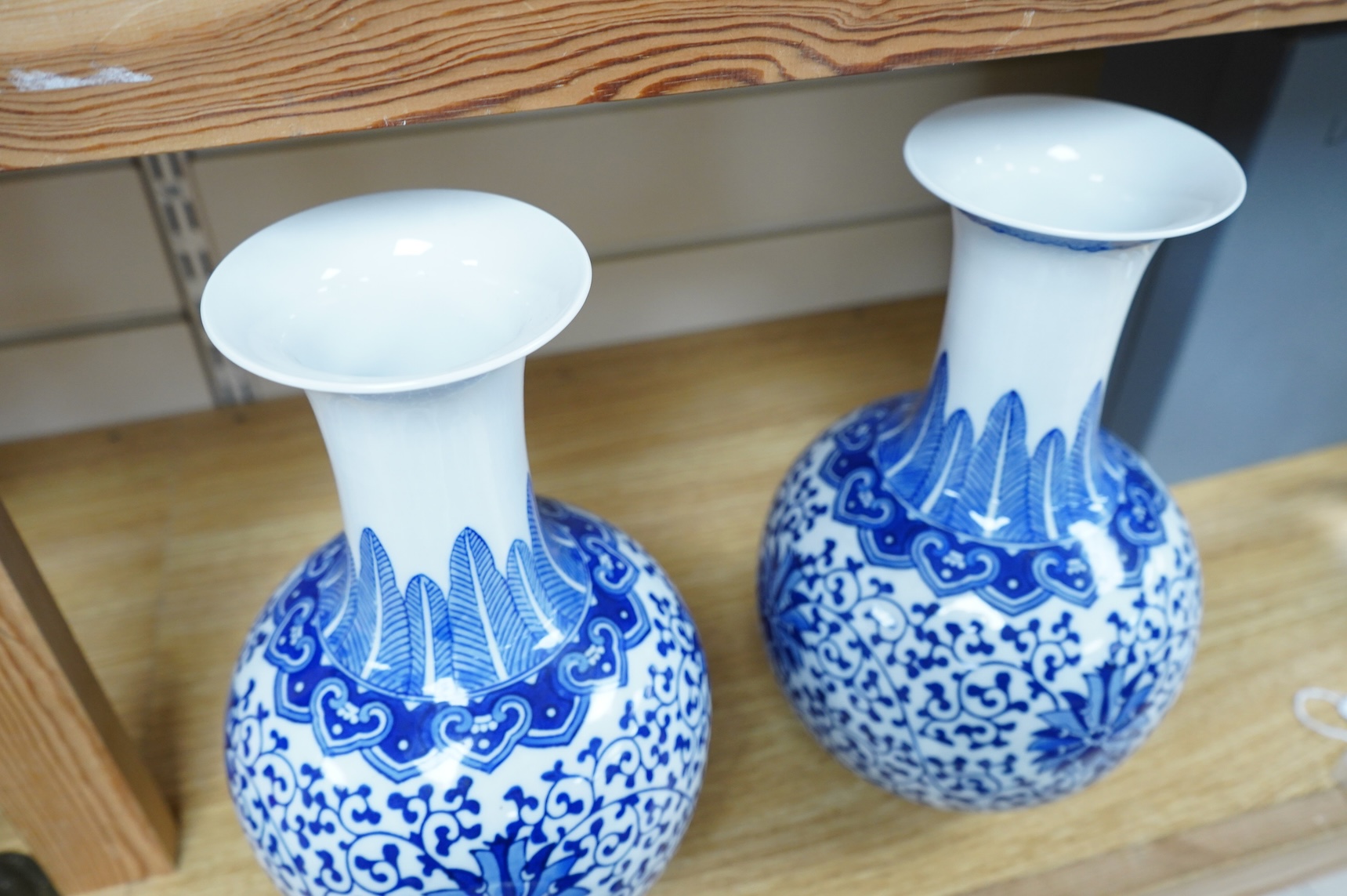 A pair of Chinese blue and white vases, 28cm high